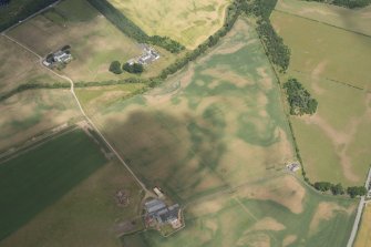 Oblique aerial view of the cropmarks at Marlefield, looking NE.