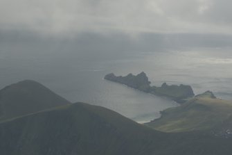 General oblique aerial view across Village Bay towards Dun, St Kilda, looking to the SSW.