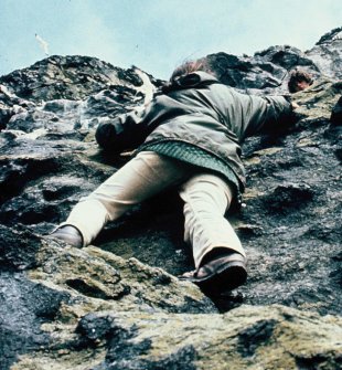 Mary Harman climbing the pitch, Stac Lee