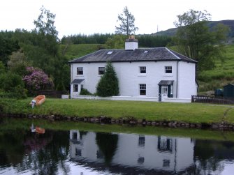 Cullochy Cottages on S bank . South cottage to right of block