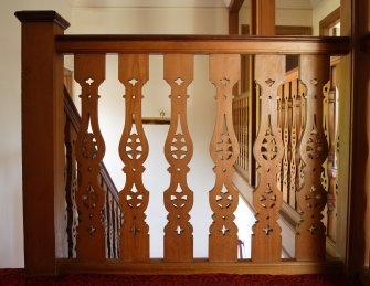 Interior, detail of pierced flat balusters.