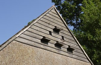 Exterior, detail of pigeon flight holes.