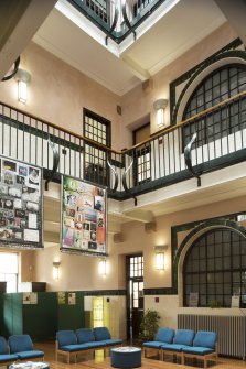 Interior. General view of central hall including upper balconies.