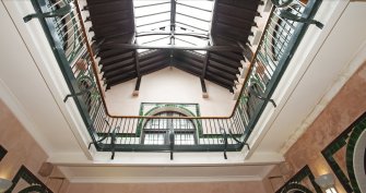 Interior. General view of second floor balcony level from first floor balcony level.