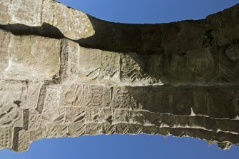 Exterior. South doorway. Detail of underside of archway.