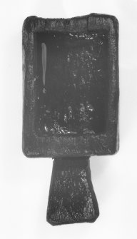 A wooden box with integral handle (DP01/119) (top view). This can be identified as an ‘oil box’, used to hold linseed oil as a sealant when caulking the joints of the outer planks with oakum, or teased-out hemp fibre. (Colin Martin)