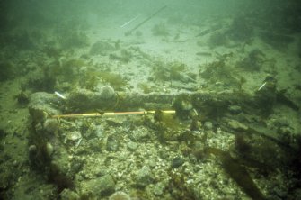 The anchor off the starboard bow quarter of the wreck, its crown to the left. Scale 1 metre. (Colin Martin)