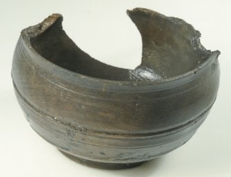 Turned maple bowl (DP93/006), diameter 102mm, height 62mm, showing evidence of biological and mechanical damage. (Colin Martin)