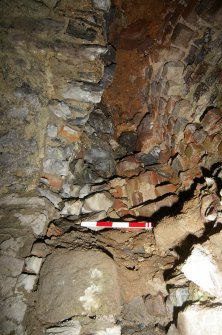 Brick-built interior of the lower left-hand pot of Kiln B. Scale in 10cm increments. (Colin Martin)