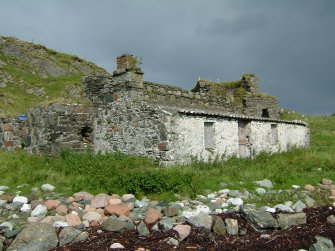 The lean-to structure on the seaward side of the enclosure was probably a store for the processed lime. (Paula Martin)