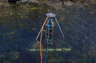 Trials have been made using sector scanning to search the loch bed for archaeological features. Here the equipment has been positioned near the canal mouth. Results so far have been encouraging, but a more sustained programme is required. (Colin Martin)