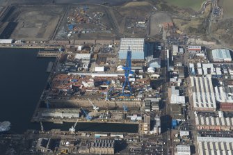 Oblique aerial view of Rosyth Dockyard showing the construction of the new aircraft carrier, HMS Queen Elizabeth, looking WNW.