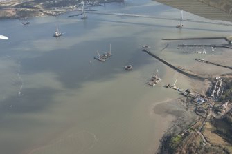 Oblique aerial view of the construction of the new Queensferry crossing at Inchgarvie House, looking E.