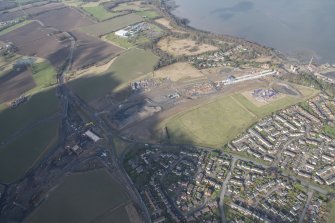 Oblique aerial view of the construction of the Queensferry crossing at Inchgarvie House, looking ESE.