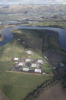 Oblique aerial view of Throsk Royal Naval Armament Depot, looking N.
