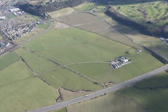 Oblique aerial view of the site of the Raploch Aerodrome, looking ESE.