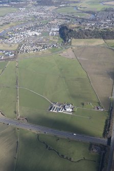 General oblique aerial view of the site of the Raploch Aerodrome, looking E.