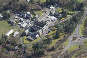 Oblique aerial view of Queen Victoria School, looking ESE.