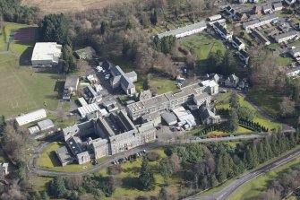 Oblique aerial view of Queen Victoria School, looking E.