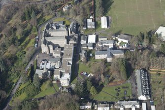 Oblique aerial view of Queen Victoria School, looking N.