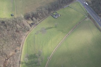 Oblique aerial view of the site of practice trenches, looking ESE.