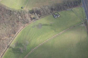 Oblique aerial view of the site of practice trenches, looking E.