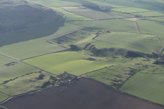 Oblique aerial view over Kippielaw farmstead towards Hairy Craig, looking to the SSW.