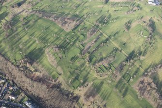 Oblique aerial view of the golf course, the farmstead and the disused race course, looking N.