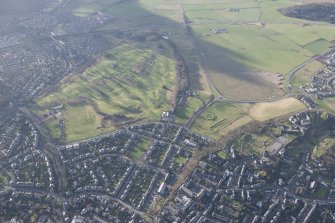 General oblique aerial view of the King's Park, the King's Knot, the golf course, the farmstead and the disused race course, looking W.