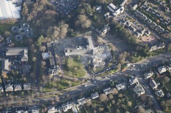 Oblique aerial view of the Viewforth Local Government Offices, Stirling, during demolition, looking ESE.