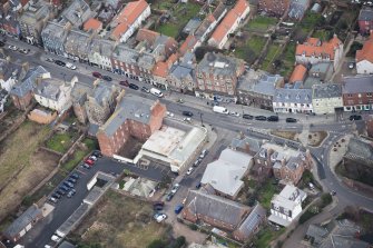 Oblique aerial view of the former New Inn barracks, looking NE.