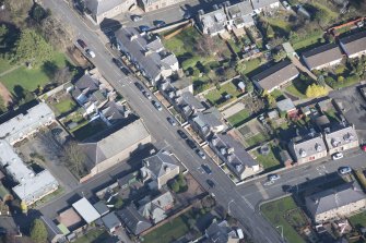 Oblique aerial view of Tayport Cinema, Drill Hall and Episcopal Church, looking NE.