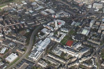 Oblique aerial view of the University of Dundee, looking NE.