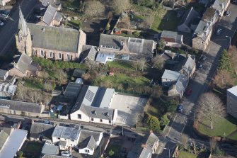 Oblique aerial view of Union Street Territorial Army Drill Hall and South Free Church, looking ESE.