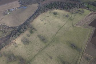 Oblique aerial view of the site of Delvine Golf Course, looking E.