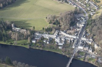 Oblique aerial view of Dunkeld, Dunkeld Catherdral and Cathedral Street Drill Hall, looking NNW.