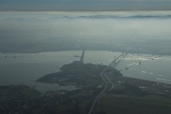 General oblique aerial view of the Forth Bridge, Forth Road Bridge and Queensferry Crossing construction, looking to the S.