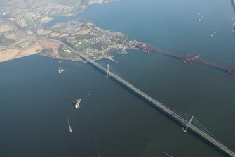 Oblique aerial view of the Forth Bridge, Forth Road Bridge and Queensferry Crossing construction, looking to the ENE.