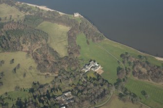 Oblique aerial view of Dalmeny House and Barnbougle Castle, looking to the NE.