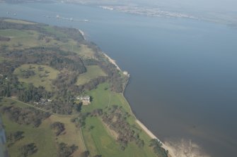 Oblique aerial view of Dalmeny House and Barnbougle Castle, looking to the N.