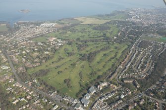 Oblique aerial view of Royal Burgess Golf Course and Bruntsfield Golf Course, looking to the NE.