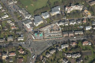 Oblique aerial view of the building site of the former Barnton Hotel, looking to the N.