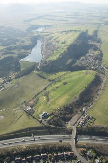 Oblique aerial view of Torphin Hill Golf Course and Torduff reservoir, looking to the SSW.