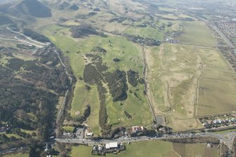 Oblique aerial view of Lothianburn and Swanston Golf Courses and Swanston Village, looking to the W.