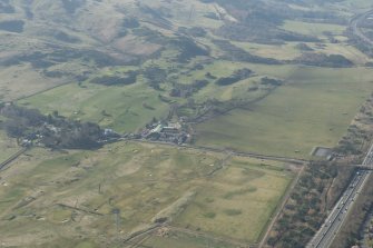 Oblique aerial view of Lothianburn and Swanston Golf Courses and Swanston Village, looking to the SW.