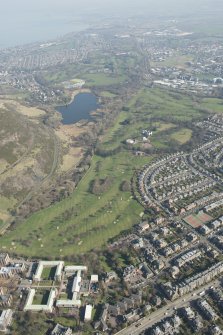 Oblique aerial view of Prestonfield Golf Course and Duddingston Loch, looking to the NNE.