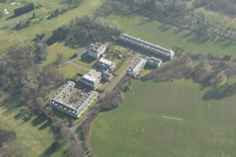 Oblique aerial view of Duddingston House Hotel, looking to the SE.