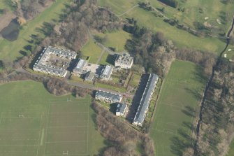 Oblique aerial view of Duddingston House Hotel, looking to the ENE.