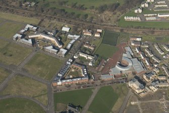 Oblique aerial view of Craigmillar Primary School, looking to the NNW.