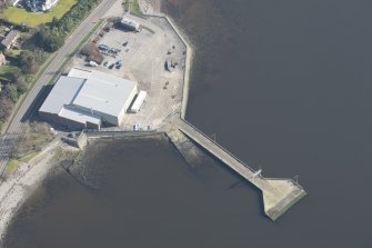 Oblique aerial view of former seaplane base, looking ENE.